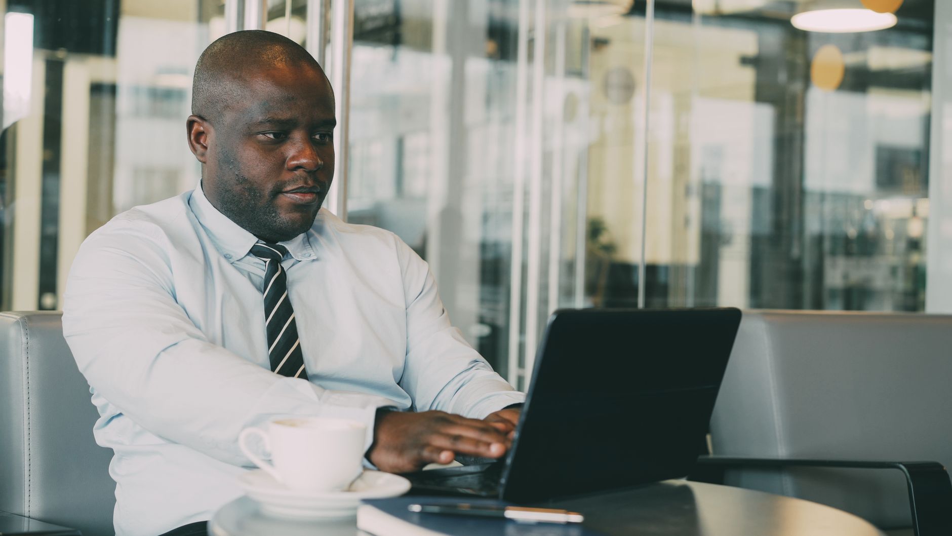 A modern insurance office using AI automation dashboards